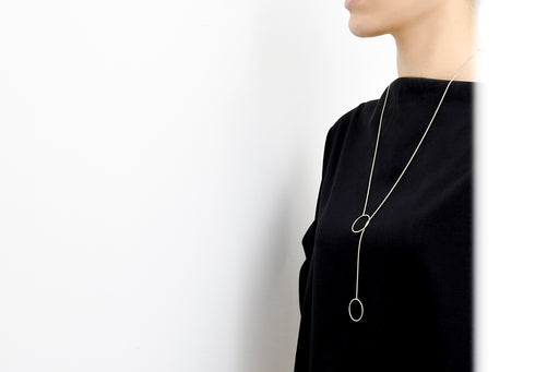 Annulet Lariat Necklace Can Be Worn in A Variety of Different Ways
