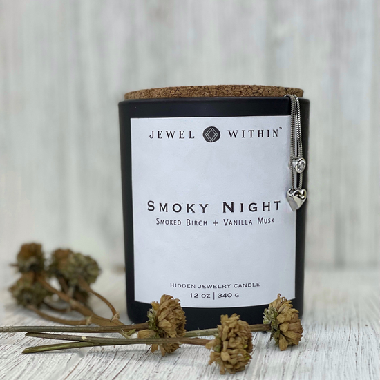 Jewel within smoky night hidden 925 silver necklace in a candle